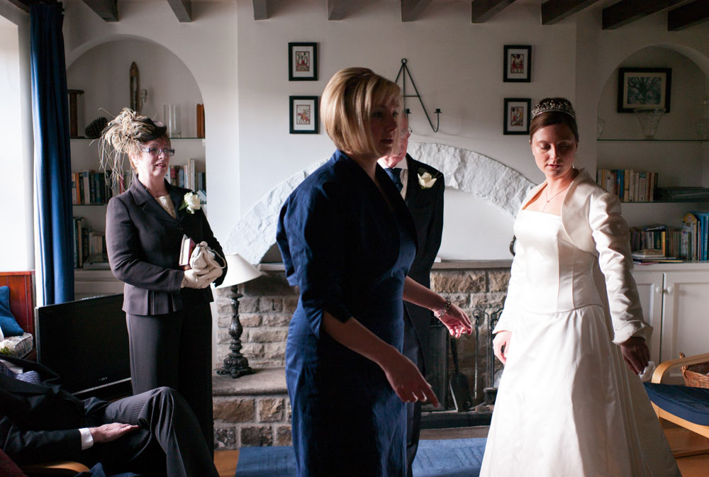 The bride and her parents gather in colour