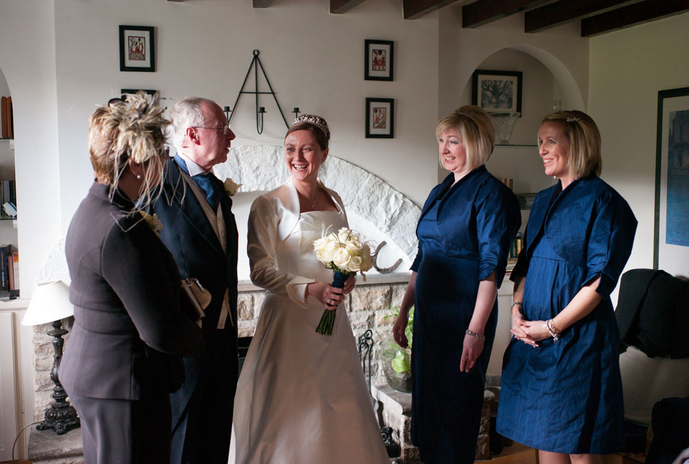 Colour photo of the family chatting at Simonstone Hall Hotel