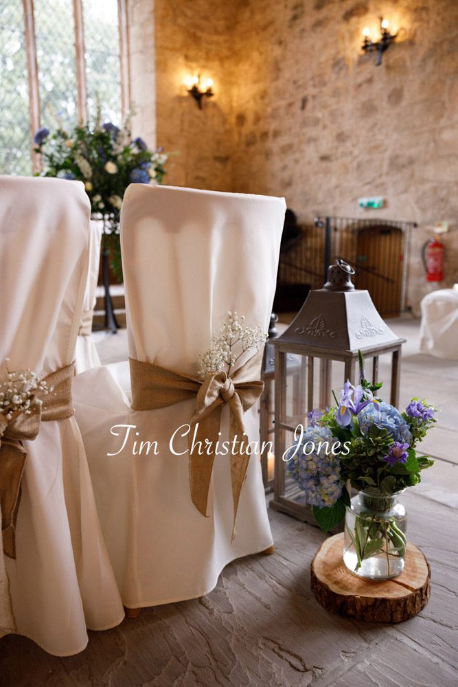 Wedding ceremony setup with floral and ribbon details at The Priests House, Barden Tower.