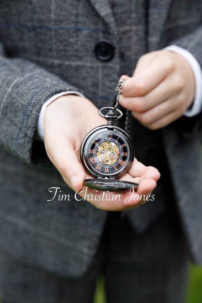 Elegant pocket watch wedding detail during Yorkshire celebration