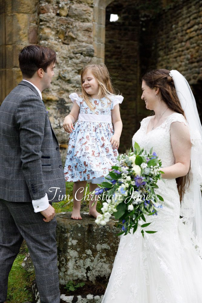 Little bridesmaid joins the newlyweds