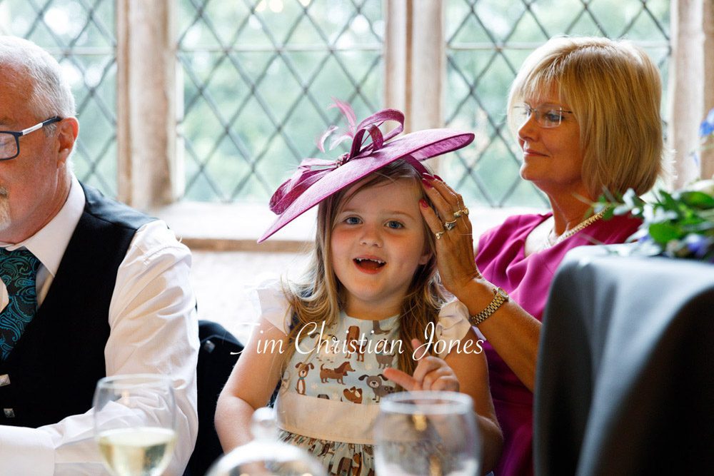 Sweet wedding moment with little bridesmaid.
