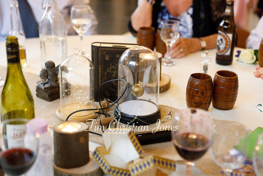 Candid scene of wedding breakfast table chaos.