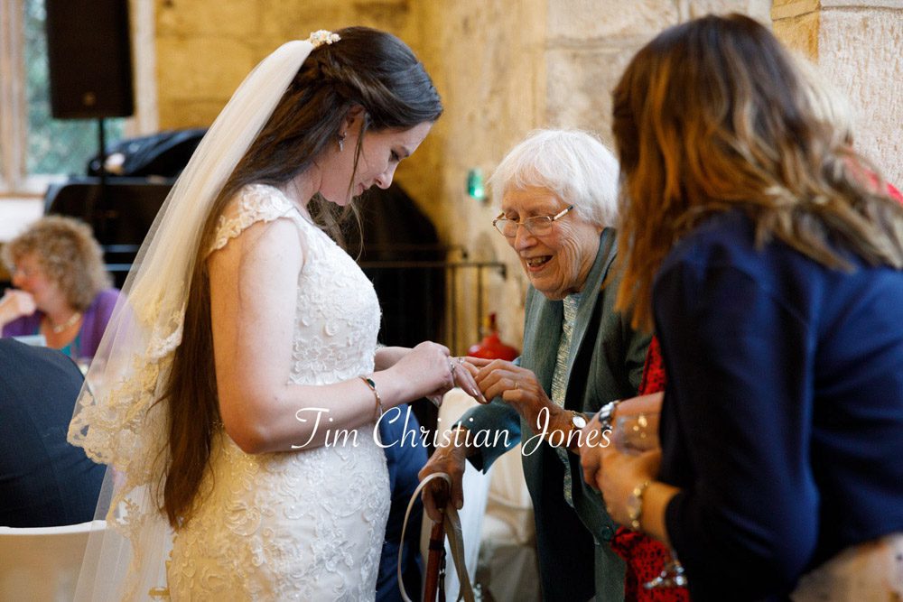 Tender farewell between bride and grandmother at The Priests House.