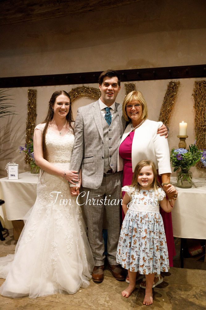 Relaxed wedding evening family portrait.